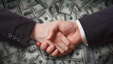 UXC enters binding $428m sale to CSC